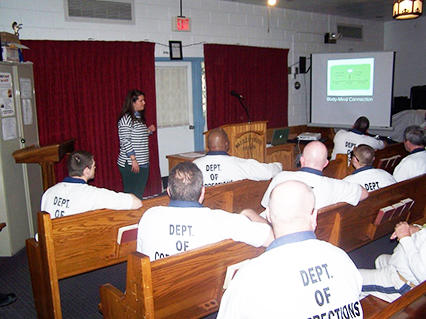 Andrea Scudder holding a class for offenders